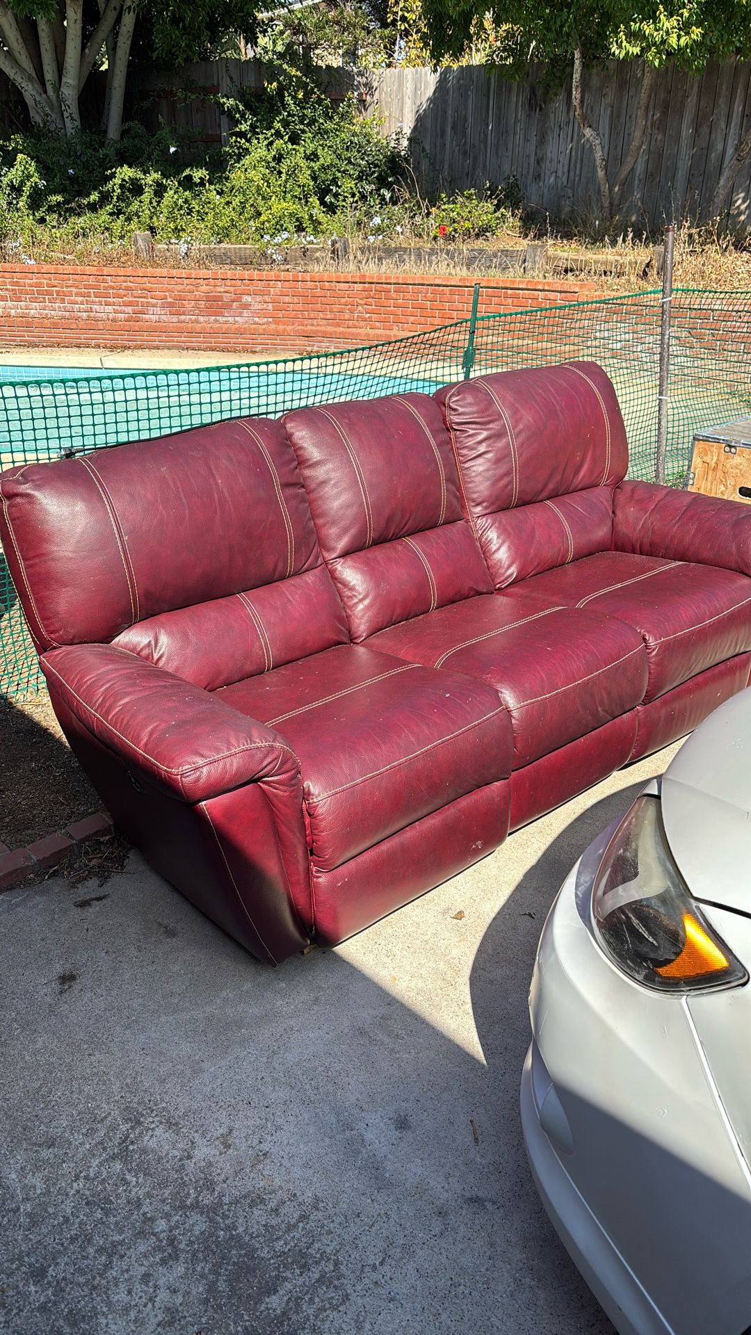 Couch burgundy reclining