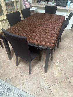 Dining table, 6 chairs Bargained