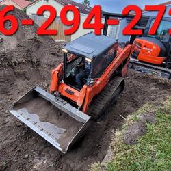 Bobcat And Excavator