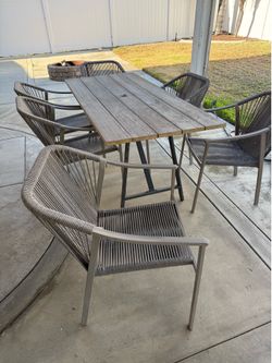 Wood patio table with 6 chairs