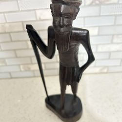 African man with walking stick – ironwood