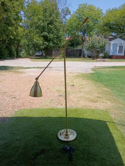 Articulating brass satin reading lamp with floor switch