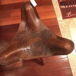 100%hand made leather folding stool. Brand new with the price tag attached.