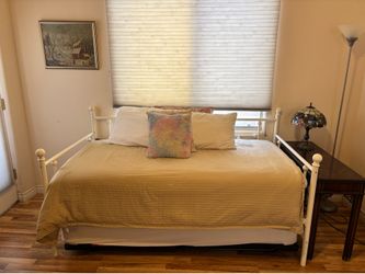 Twin trundle bed with pop-up second bed