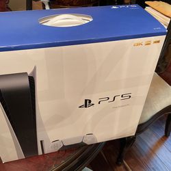 Used PlayStation 5 + 2 Controllers 3 Games