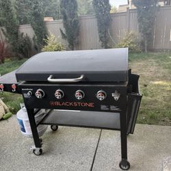 Blackstone 4-Burner Outdoor Griddle with Hood LPG