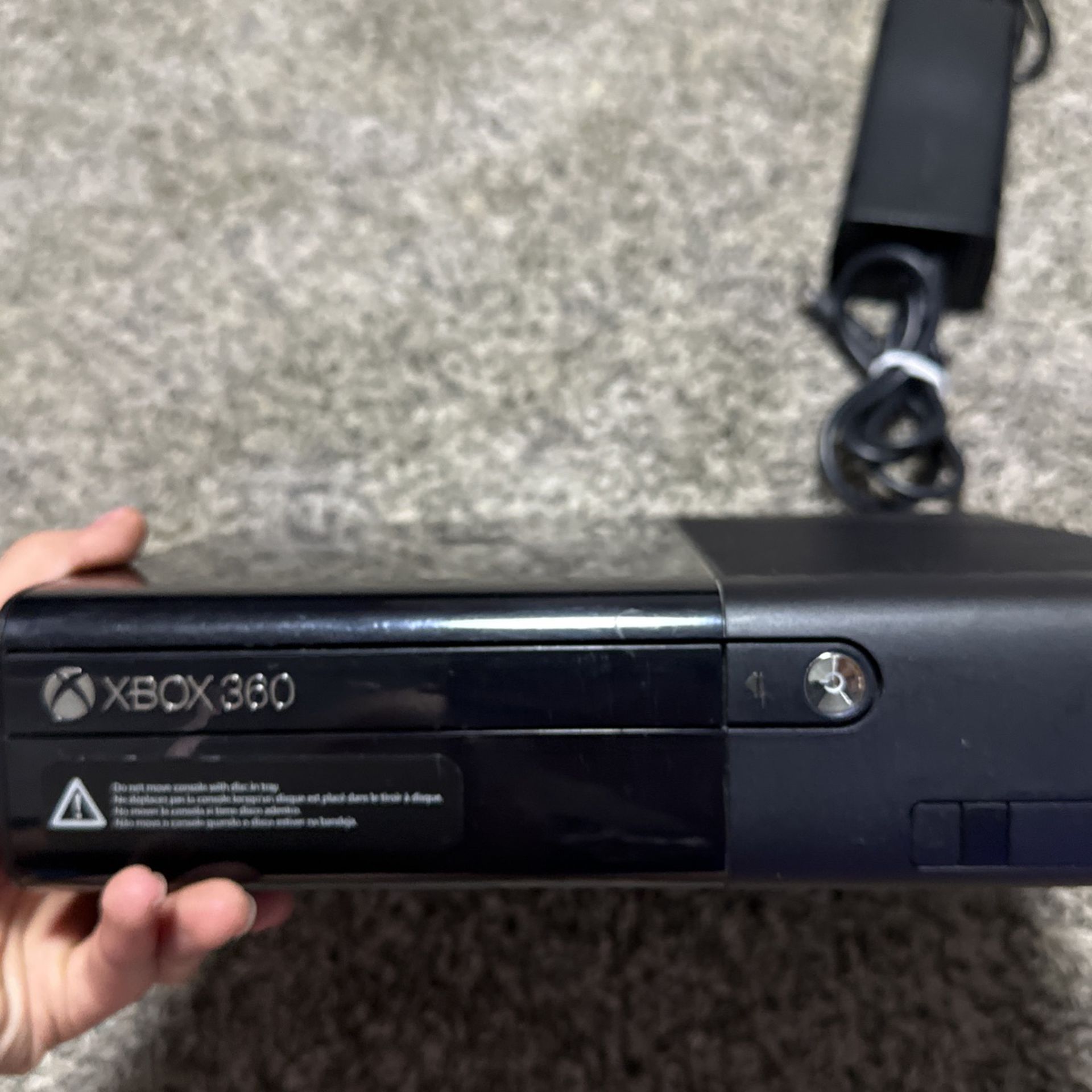 xbox 360 with games, sensor, and controller