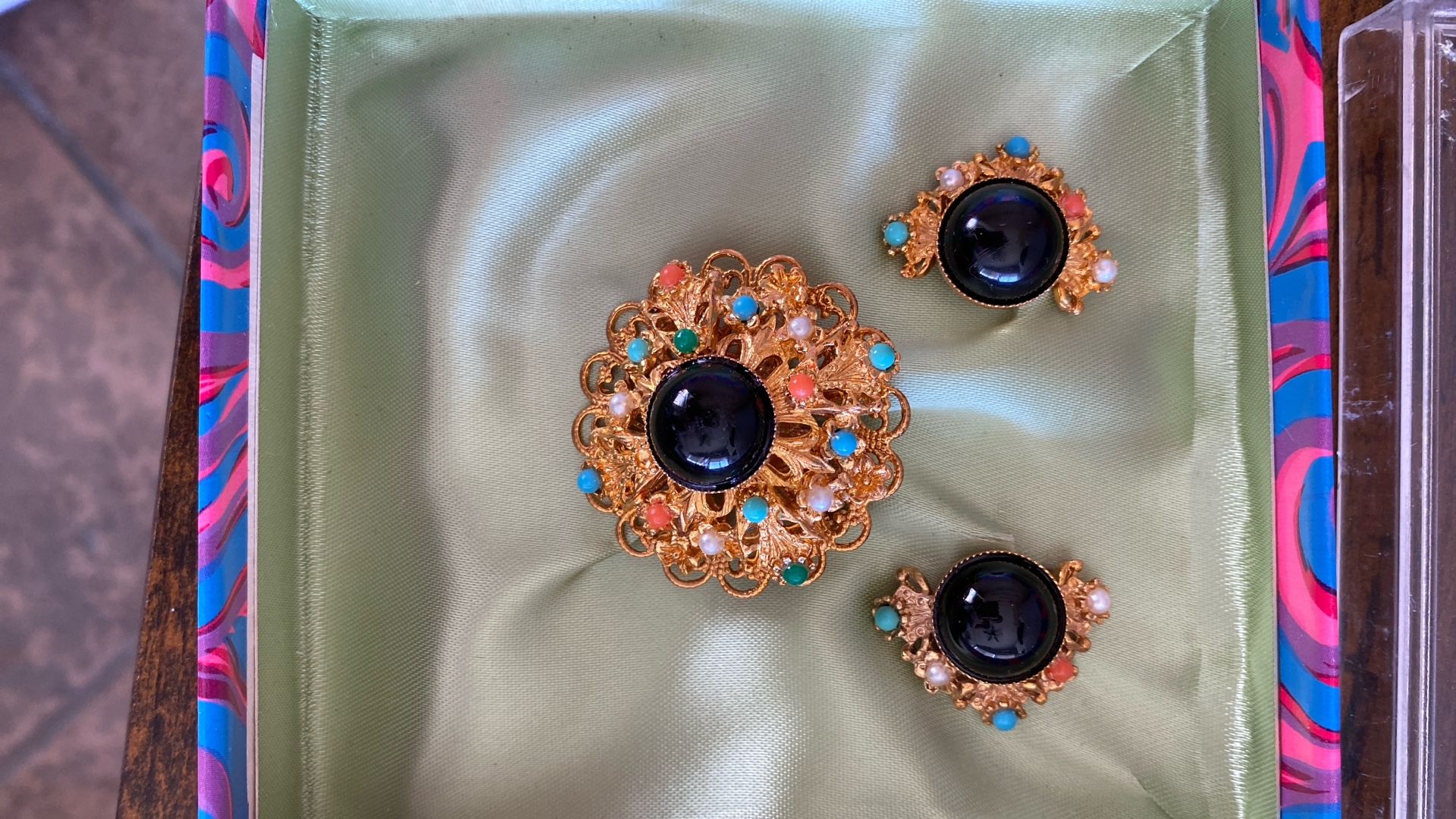 a vintage West Germany brooch and earrings set with faux pearls and glass stones. 