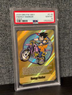 PSA 10 Gold Energy Marker E-49 Goku Motorcycle Dragon Ball Fusion World SB01