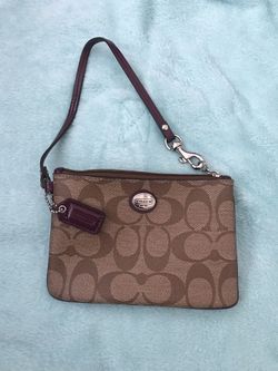 Brown coach wristlet