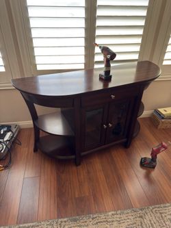 Martin St. James accent hall console table with a walnut finish.