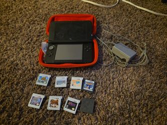 3dsxl red w/ case and games