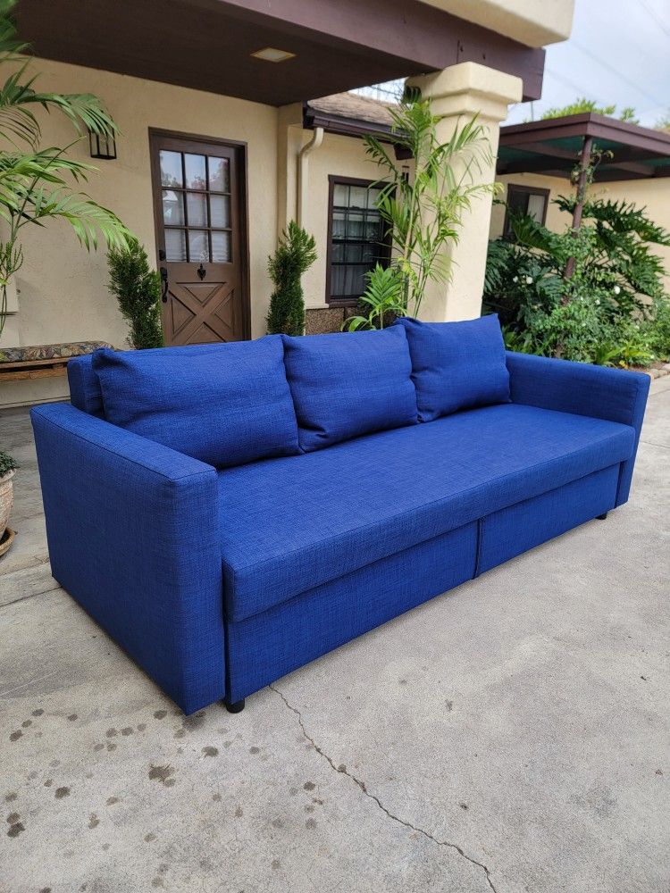 Modern Blue Sofa Bed with Hidden Storage – Like New