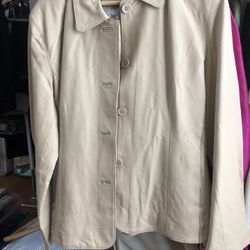 Leather jacket (lady’s) new with ticket price on color beige