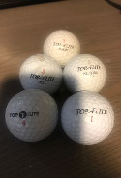 5 golfs balls