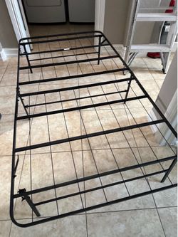 Twin metal frame plus mattress