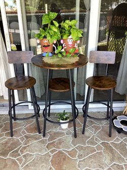 Tall table with two chairs
