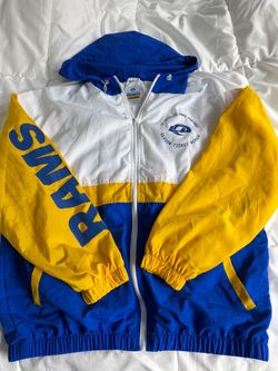 NFL Los Angeles Rams windbreaker jacket in white, blue, and yellow with 'RAMS' text on the sleeve #nfl #rams