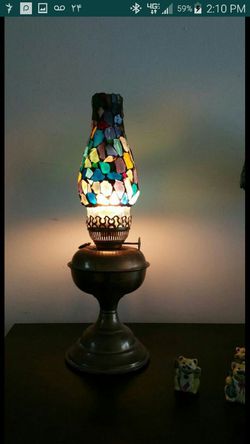 antique oil lamp all hand made with color glass and turquoise stone amazing when lamp is on fire