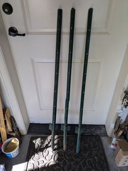 Three U channel 4 feet high fence posts