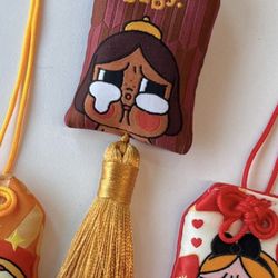 pop mart crybaby good luck amulet charm - brown