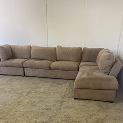 4-Piece H.M Richards Sectional Couch *Free Delivery*