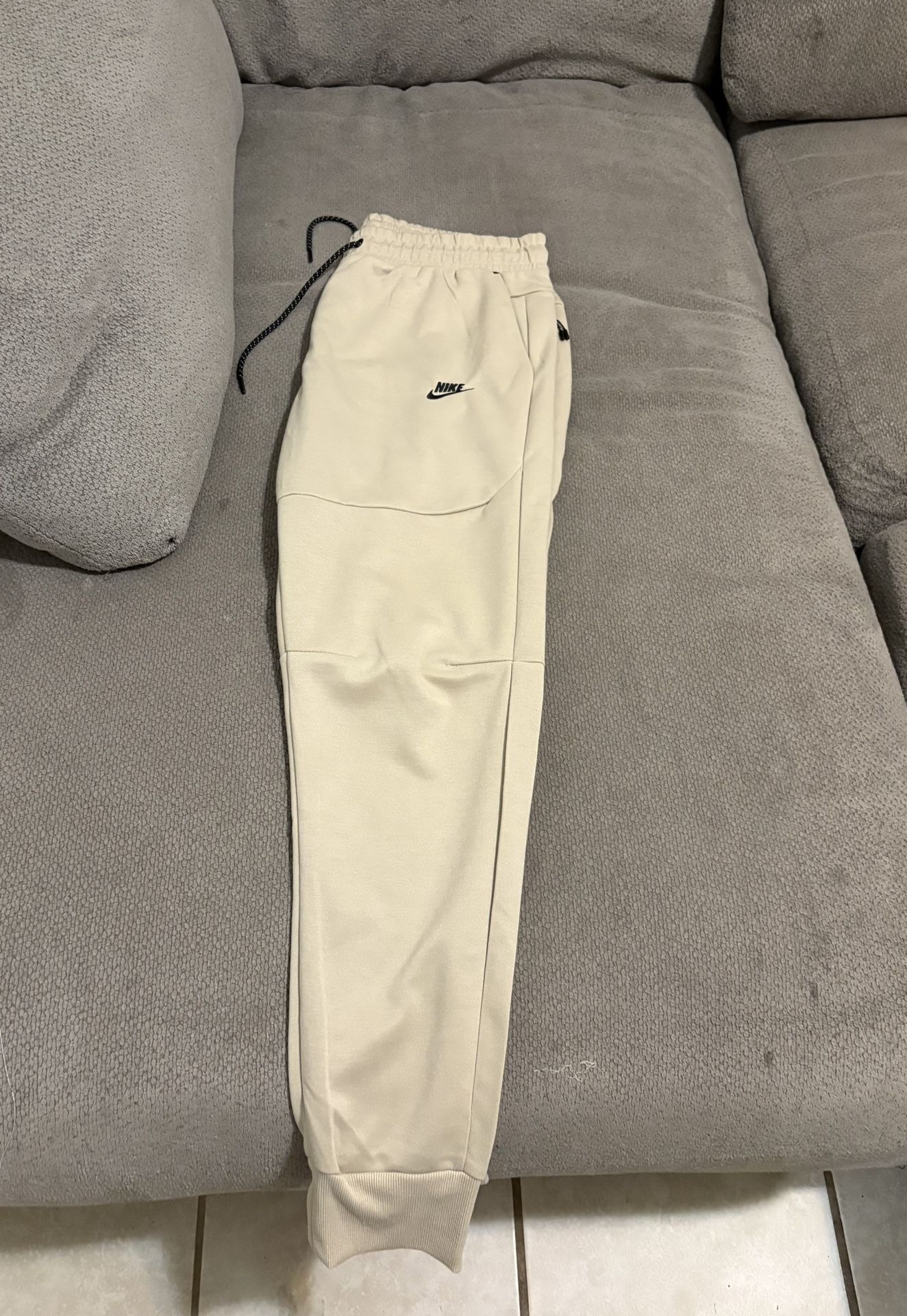 Tan Nike Tech Size XL For both