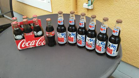 Antique glass Pepsi and coke bottles