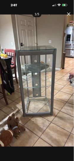 Glass and Silver Metal Media Tower Stand
