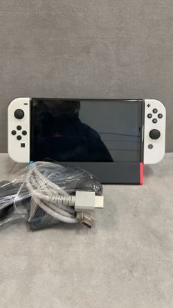 Nintendo switch OLED with dock and cord and controller Nintendo switch OLED with dock and cord and controller
