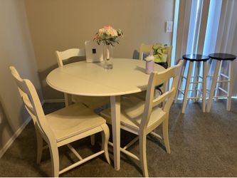 Round table with four chairs