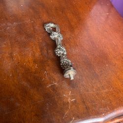 This appears to be a decorative fork from a vintage Coppercraft Guild oversized fork and spoon wall decor set from the 1970s. The items in these sets 