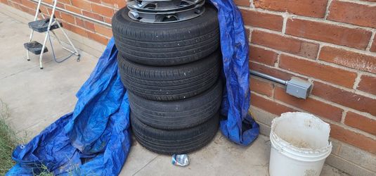 Set Of Stock 02 Altima Tires