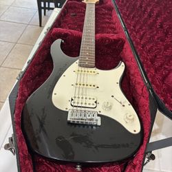 Peavey Amplifier and Peavey Electric Guitar 