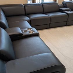 New 8 Piece 3 PWR Reclining Sectional.  Genuine Italian Leather.  123” X 151” X 35”H.  Free Delivery!