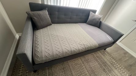 Dark Gray Upholstered Twin Size Daybed. Mattress included.
