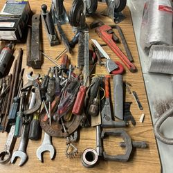 Huge garage sale, tools, antique figurines, China, silverware, and much more basketball cards, antique clocks, anything and everything