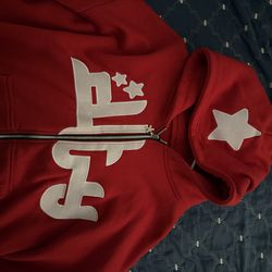Divide the youth zip up red