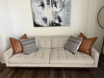 Modern beige mid-century style sofa