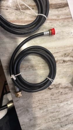 LP gas hoses 1/4” and refillable cylinders.