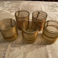 Set of 5 candle holders with individual boxes for each. 
