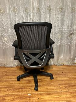 Black ergonomic mesh office chair