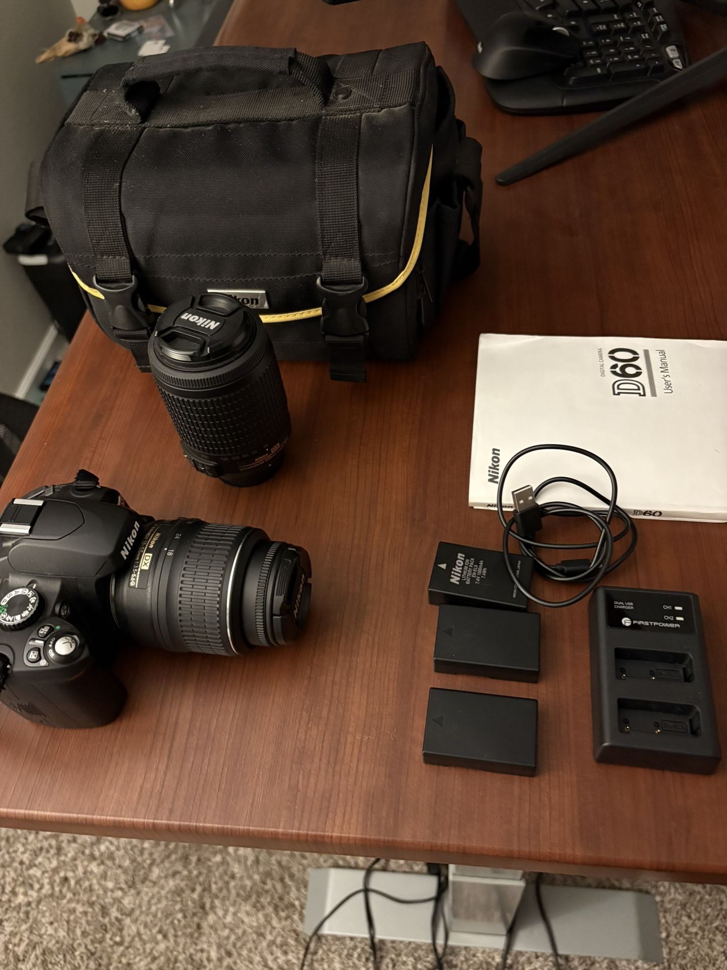 Nikon D60 + Lenses, batteries, & charger.