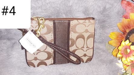 New/used Coach Wristlets