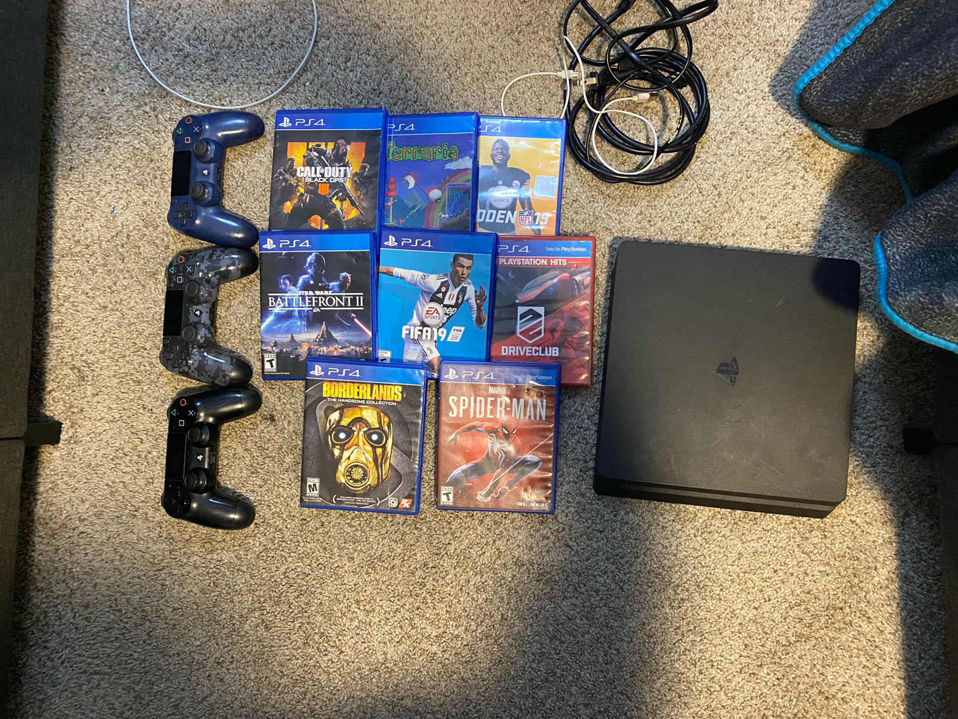 PS4 Slim With Controllers and Games