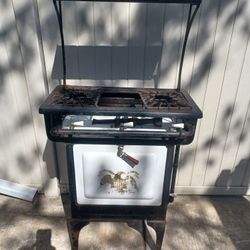 Antique Stove(Plant HOLDER.  )?