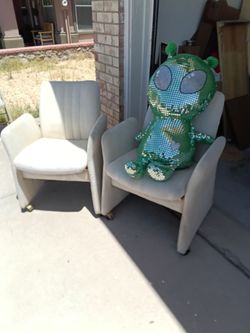 2 White Beautiful Chairs