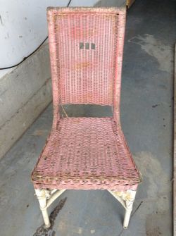 Pink antique wicker chairs