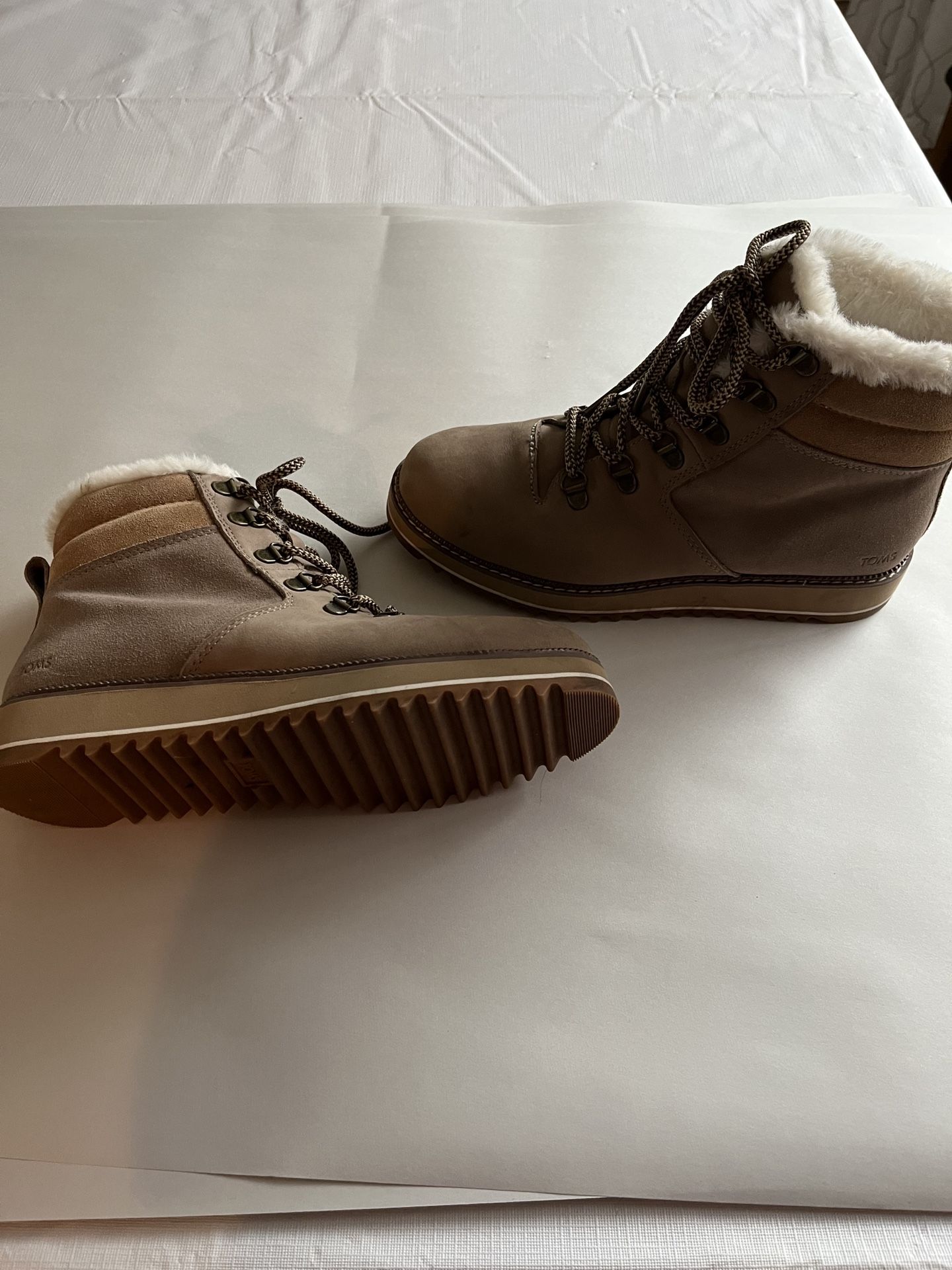 TOM’S boots. Size 8