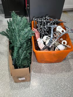 Small fake Christmas tree and Halloween decorations
